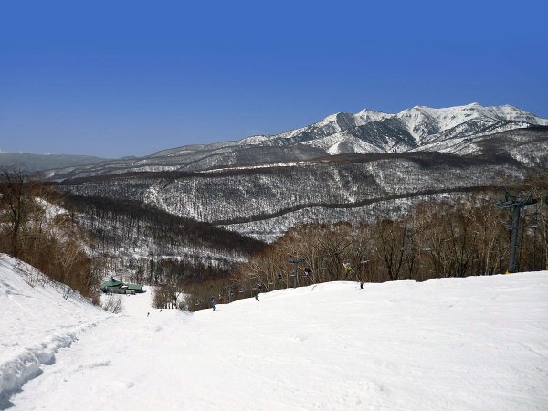 Piste run looking over the valley at White World Oze Iwakura