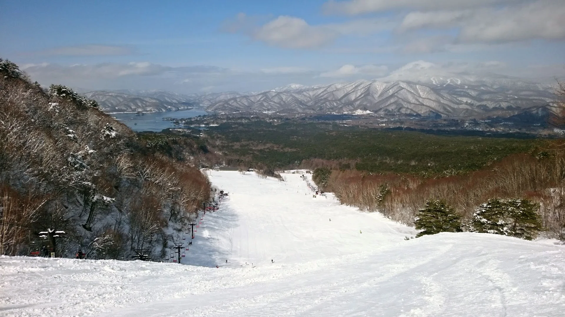 Piste run at Urabandai with views over the lake
