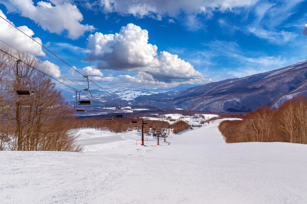 View of the valley and ski run at Amihari Onsen Ski Resort