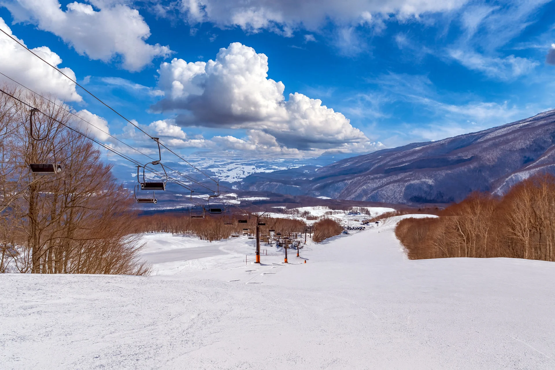 View of the valley and ski run at Amihari Onsen Ski Resort