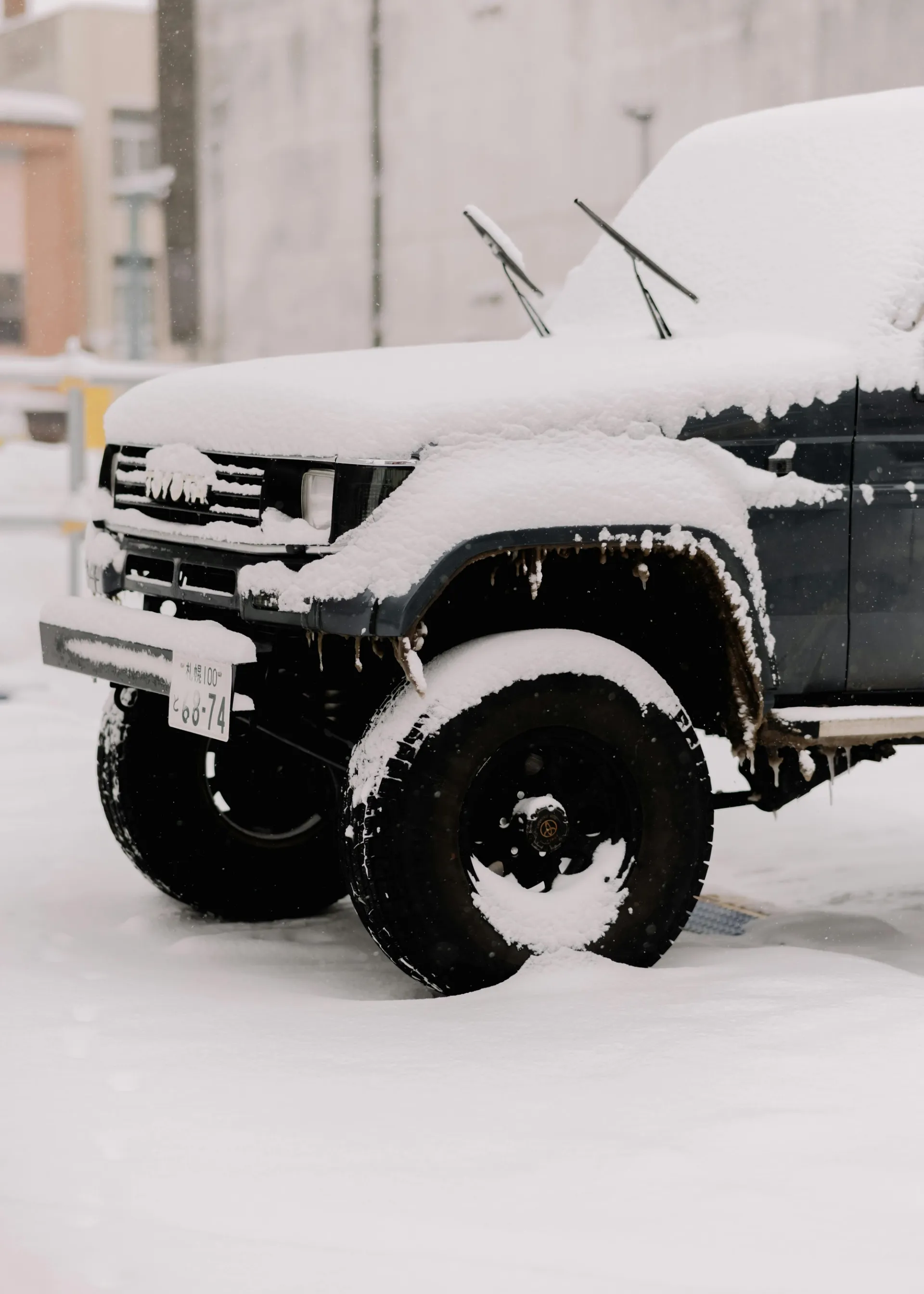 Ready to roadtrip - car covered in snow