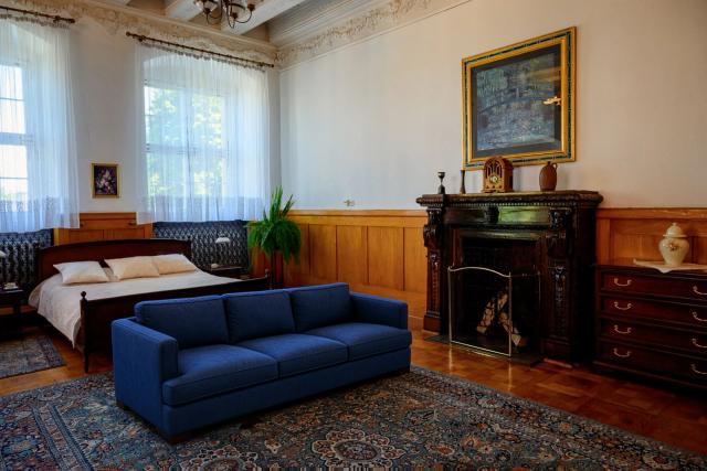 Replace two armchairs with a sofa: After