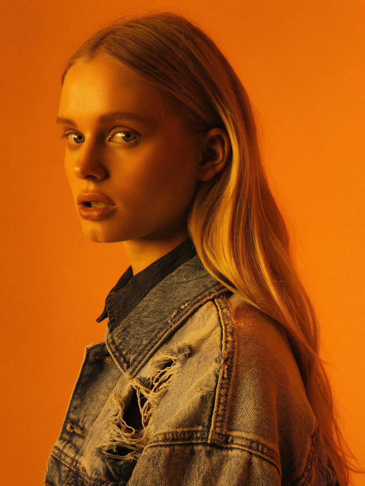 Portrait against orange