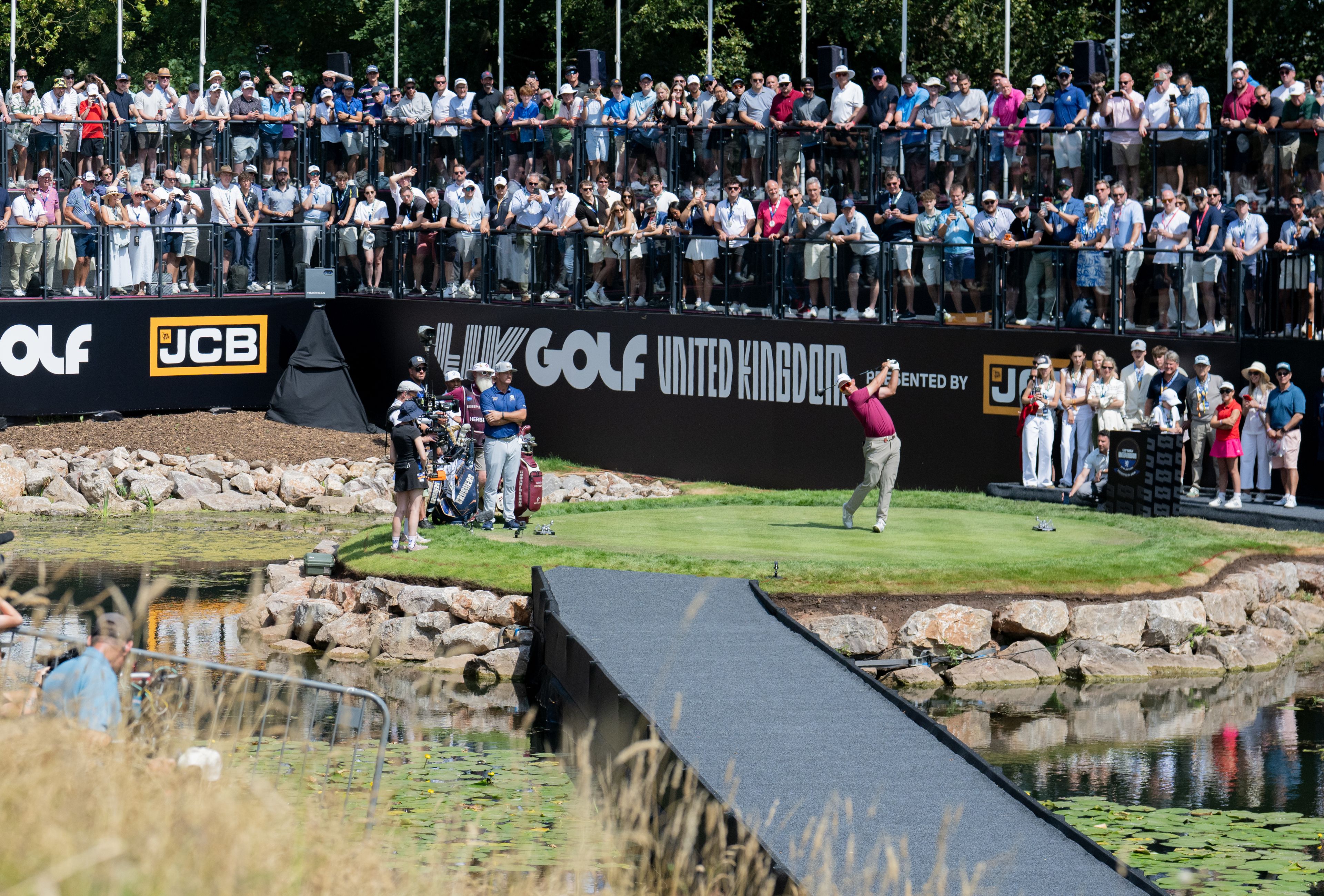Lucas Herbert and Bryson DeChambeau on the first hole at LIV Golf UK in 2026.