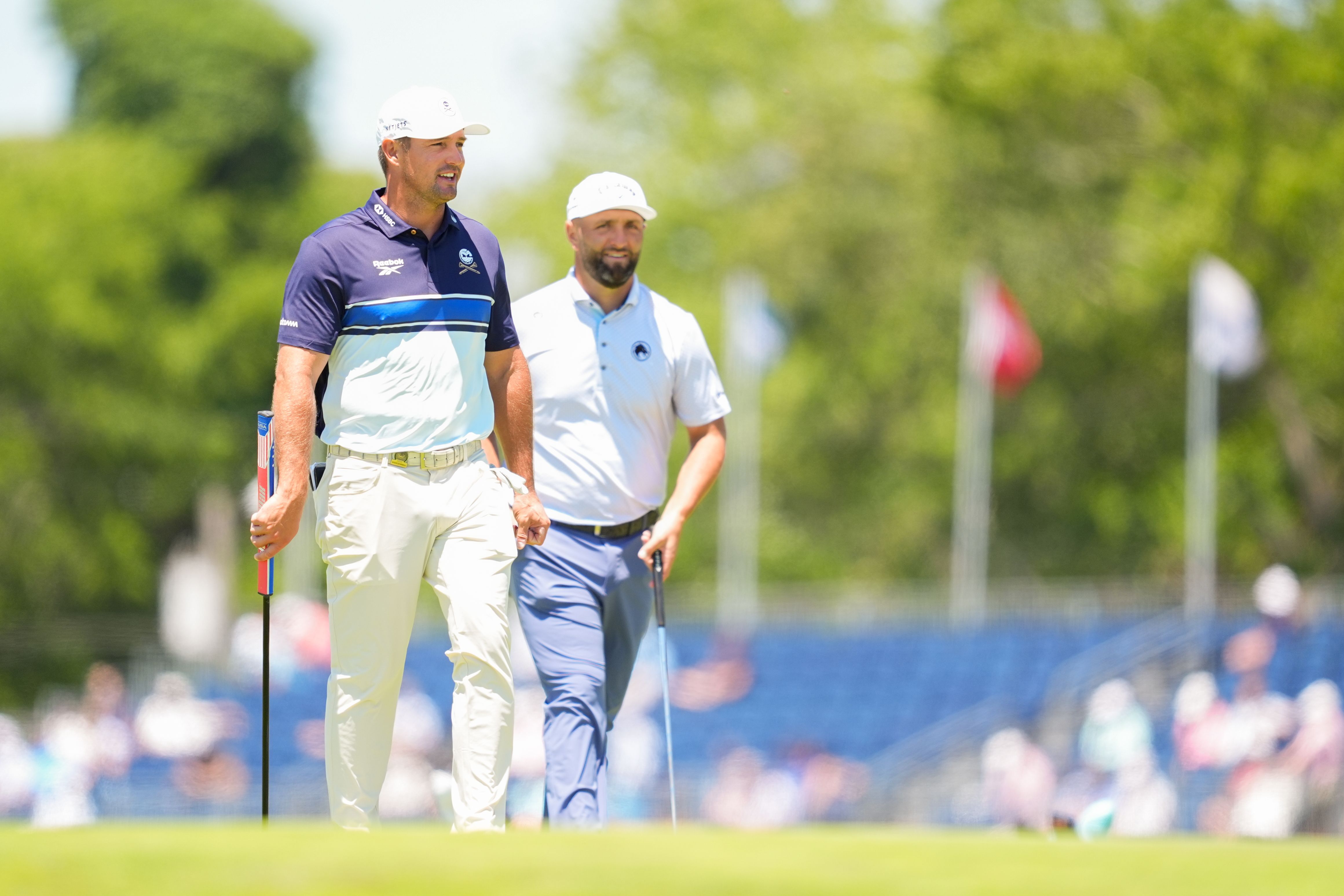Jon Rahm and Bryson DeChambeau are seen during a practice round at the 2026 U.S. Open.