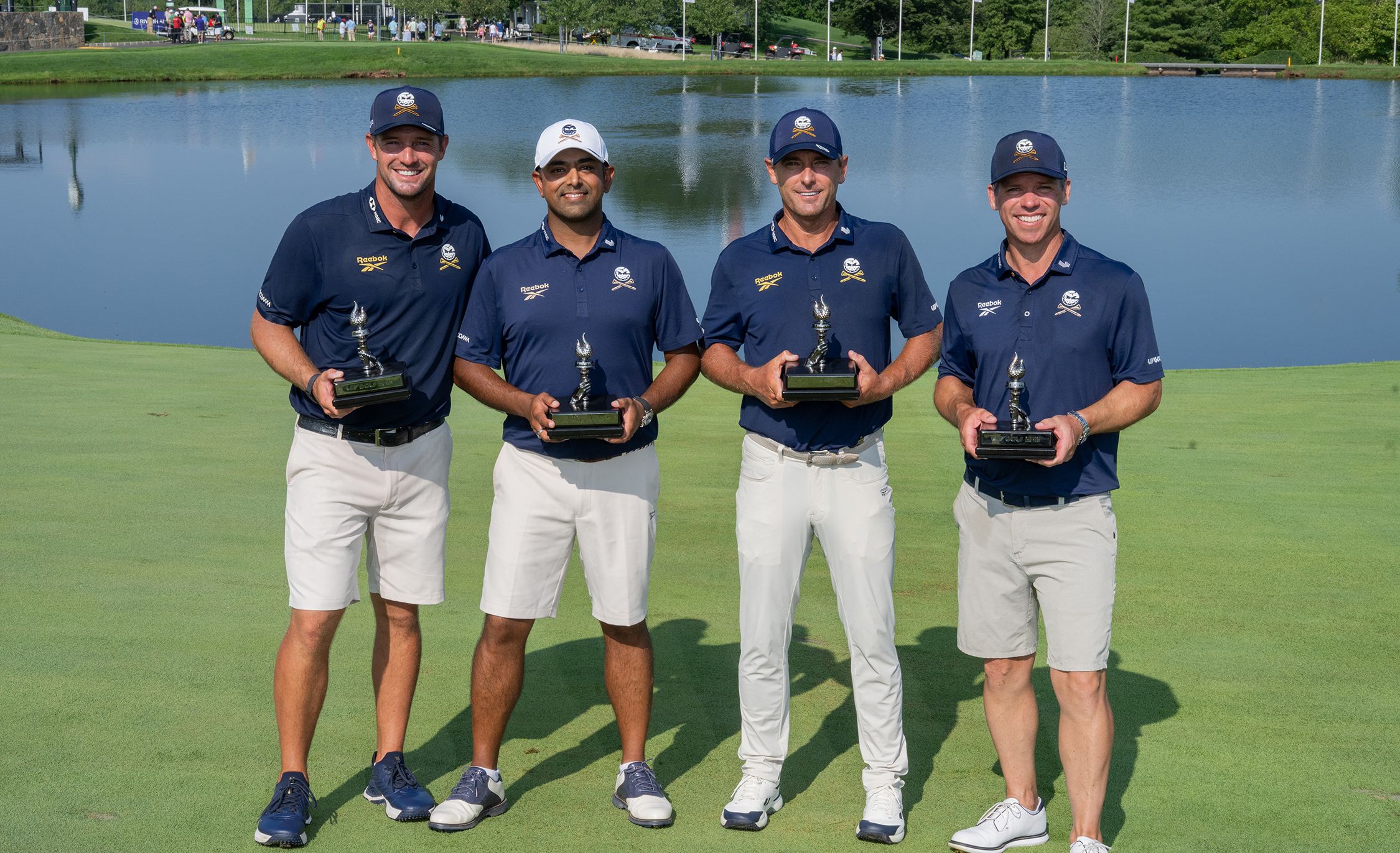 Crushers GC pose with trophies at LIV Golf New York