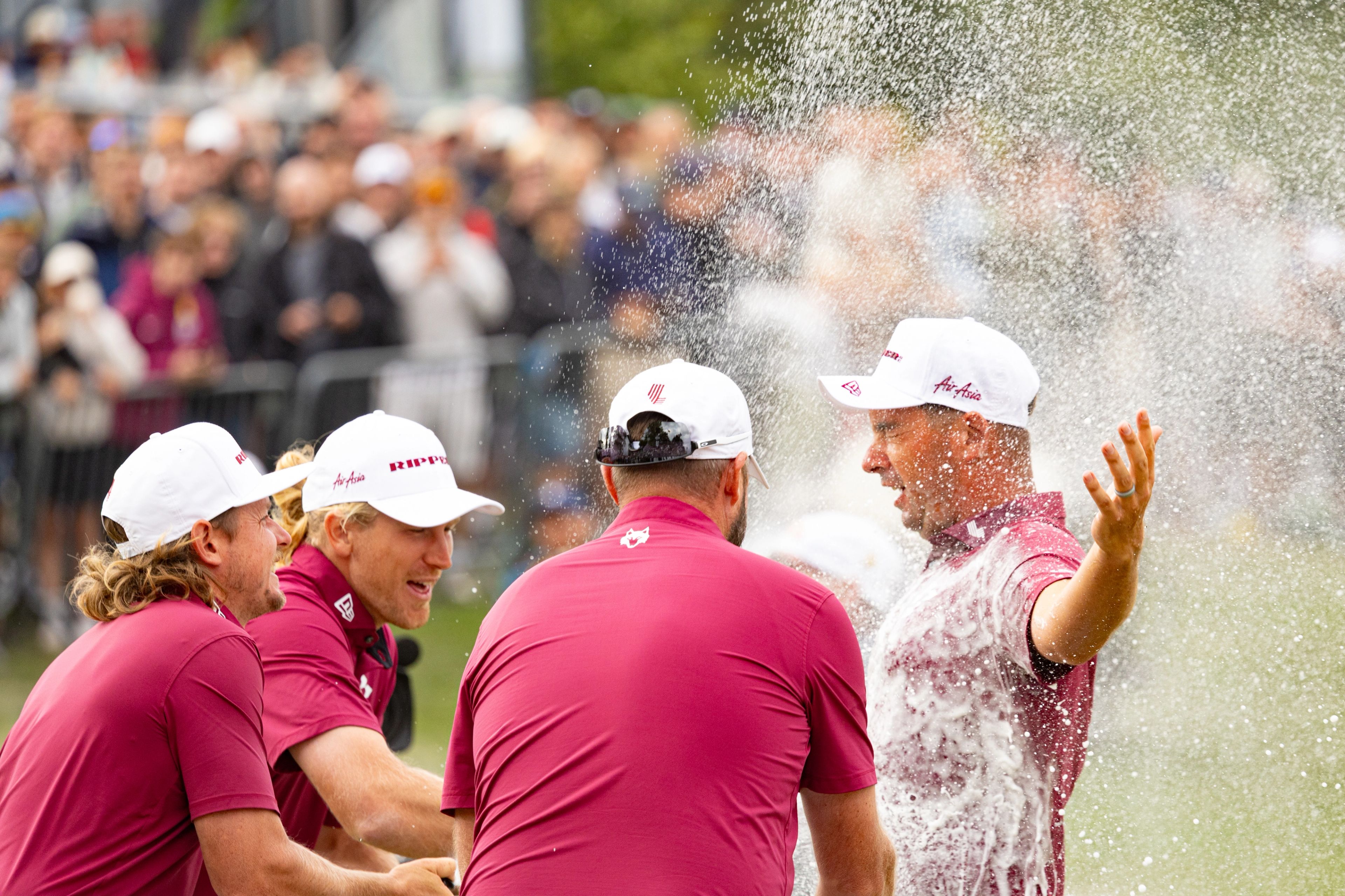 Lucas Herbert celebrated with this teammates after winning in the United Kingdom.
