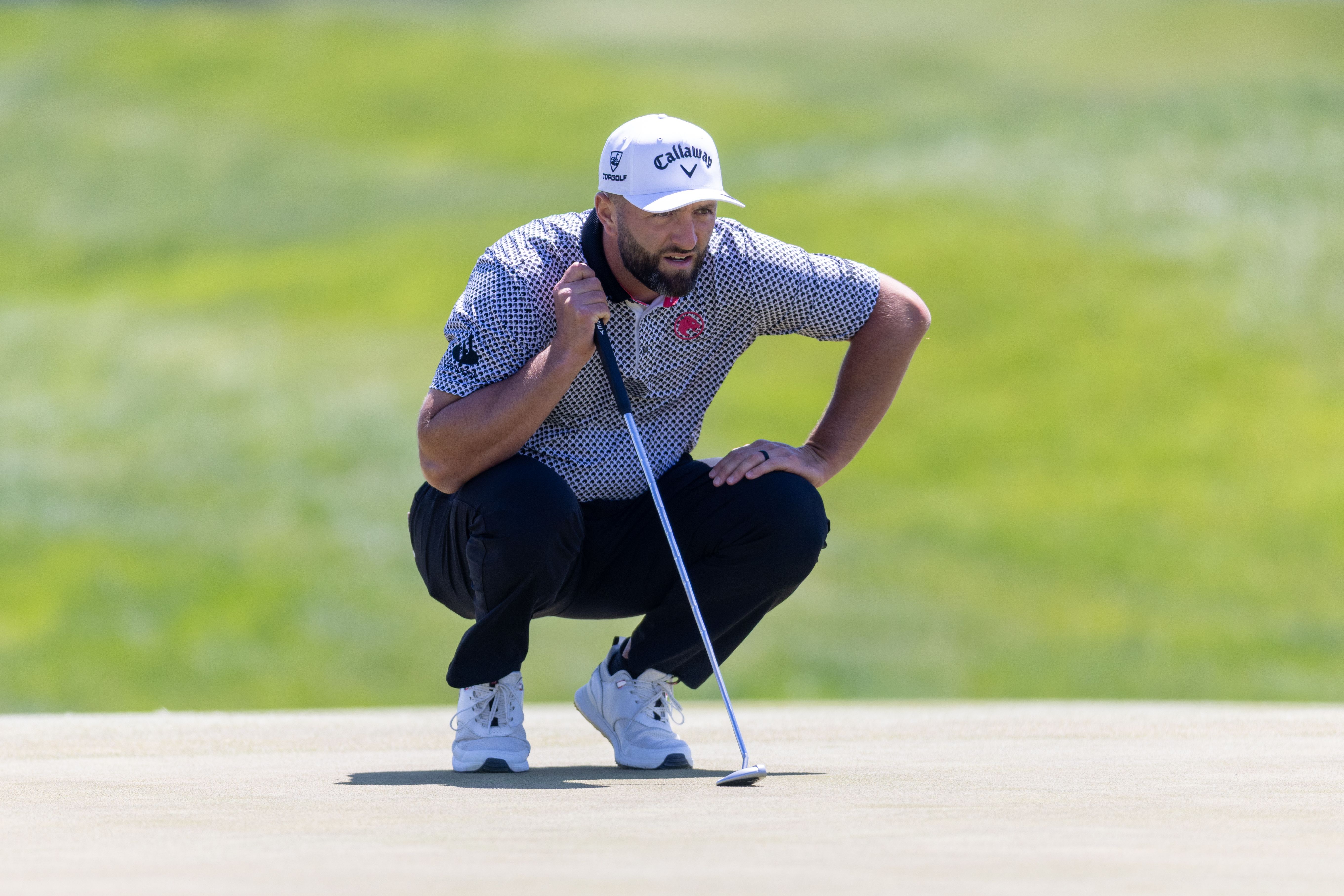 Jon Rahm lines up a putt at LIV Golf Virginia 2026. (Photo by LIV Golf)
