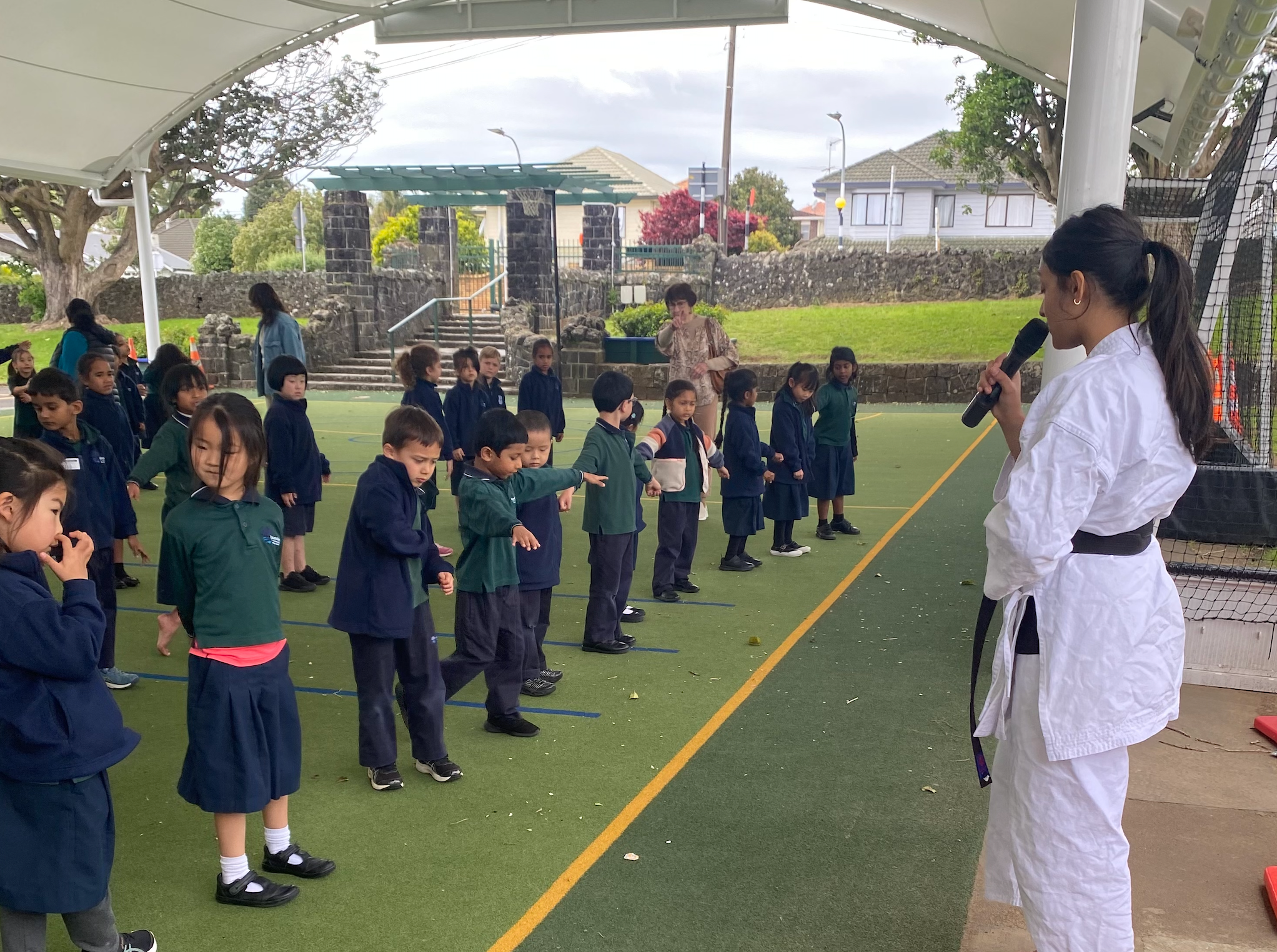 Karate instructor teaching children