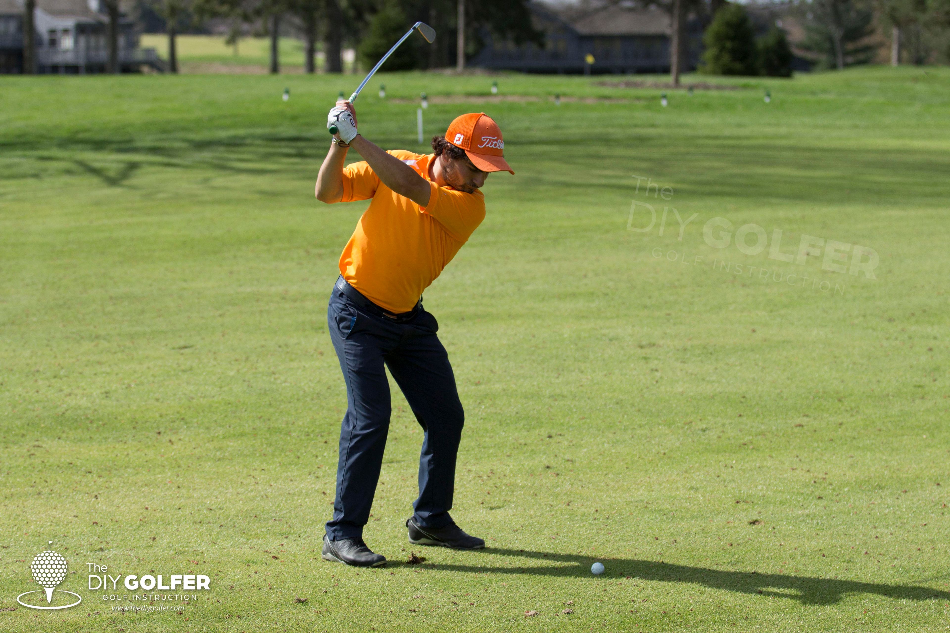 Golf Swing Photo: Orange Shirt Backswing