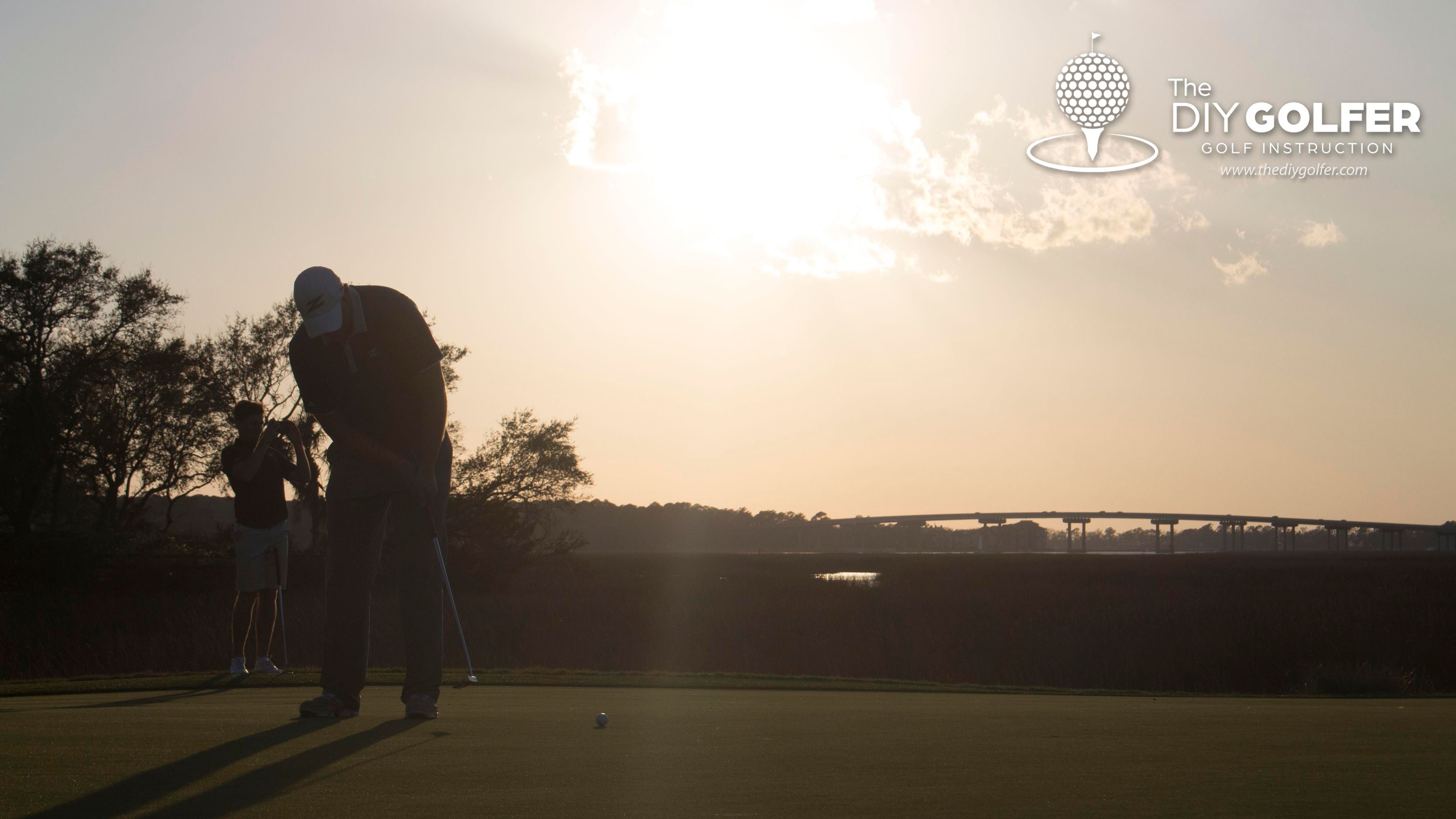 Golf Putting Photo: Hitting Putt in the Sunset