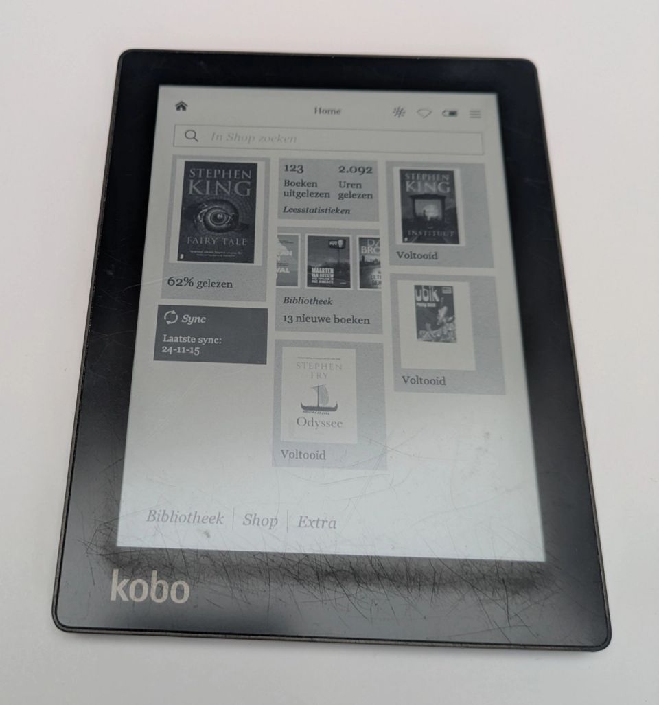 Kobo Aura (2015) close-up showing surface scratches — visible when off, invisible while reading