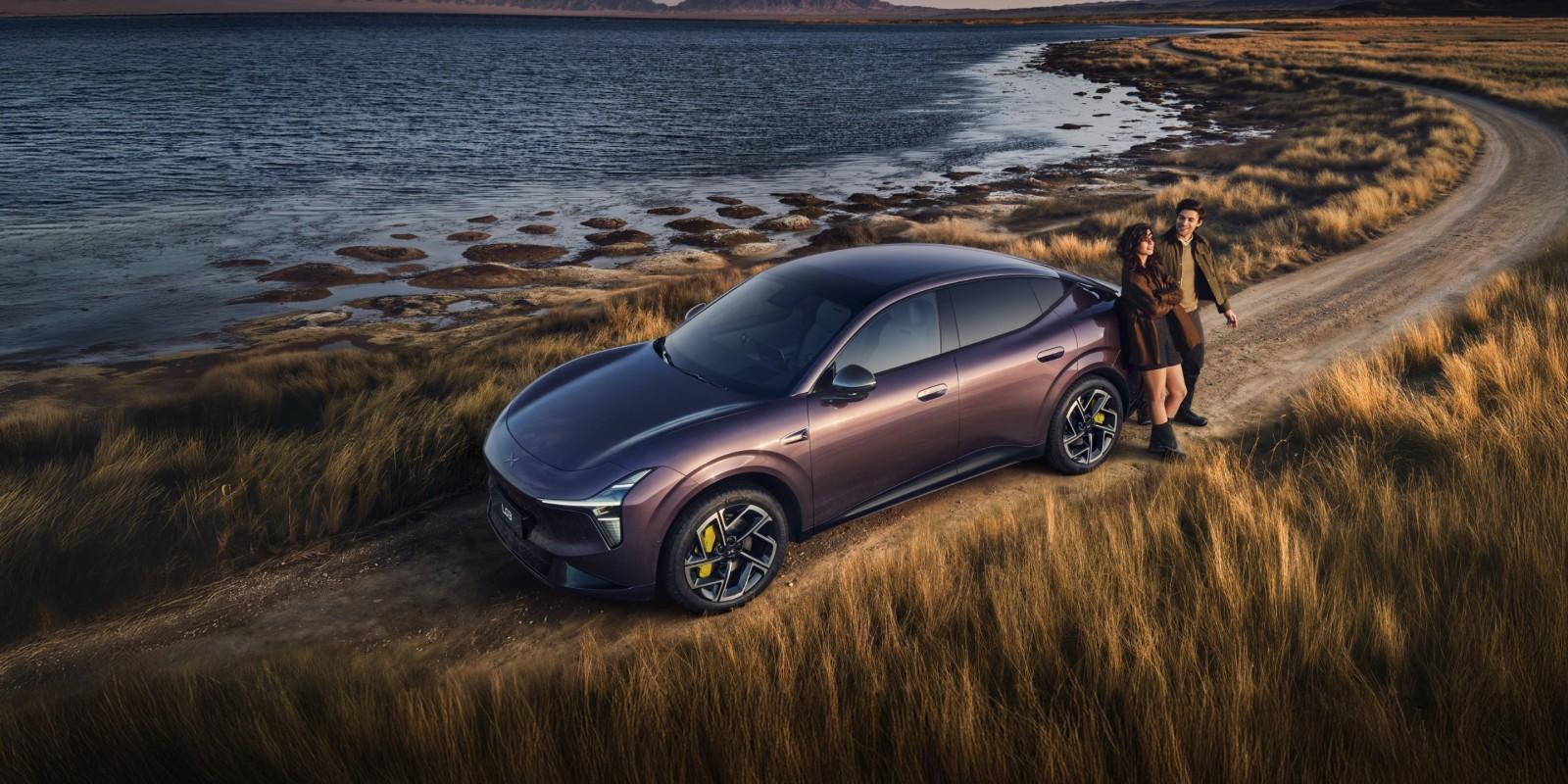 2027 XPeng L03 electric SUV coupe parked beside a lake