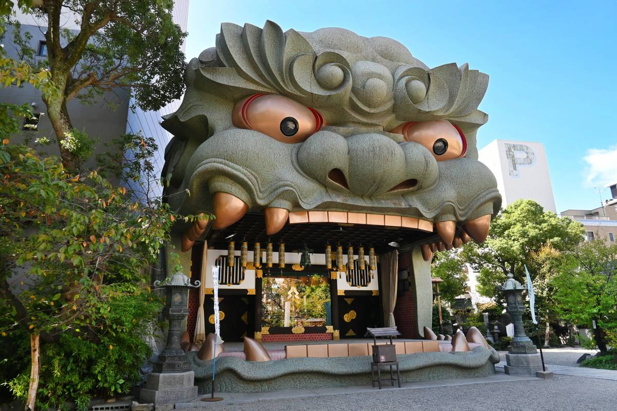 Giant lion head-shaped shrine entrance.