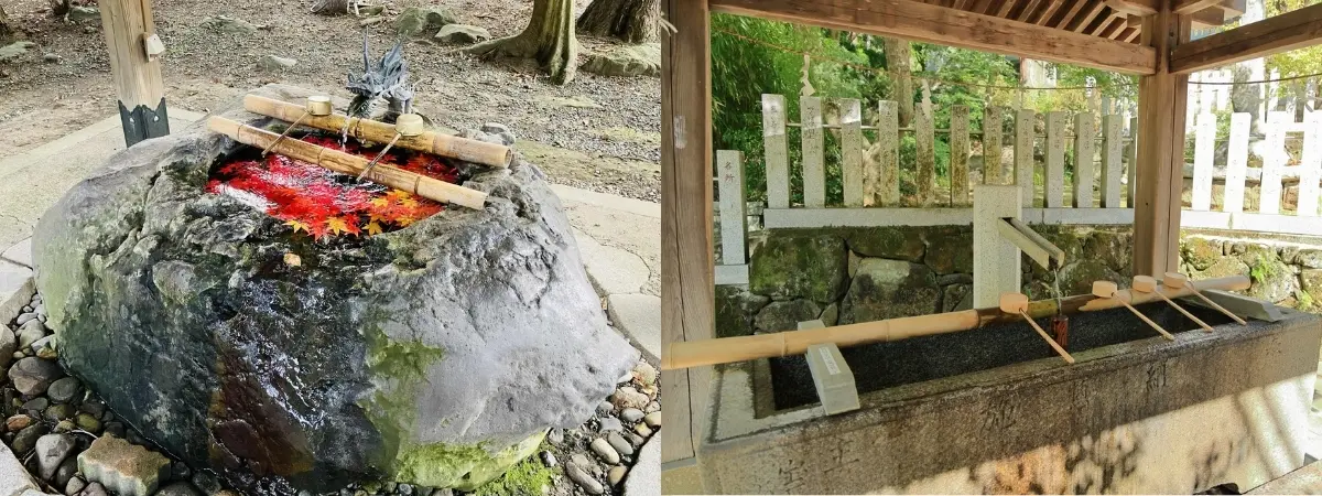 Two Japanese purification fountains, one a rock basin with red leaves and a dragon, the other a long stone basin with ladles.