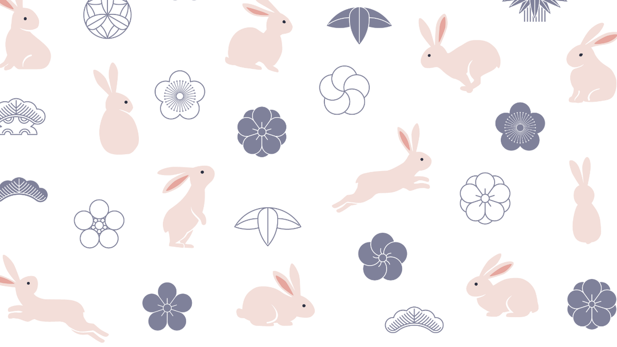 Seamless pattern of light pink rabbits and grey/blue Japanese motifs on white.