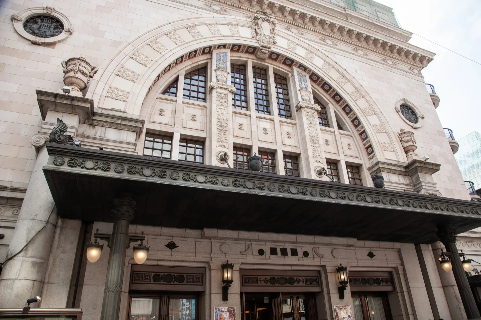 a large building with a large arch over the entrance .
