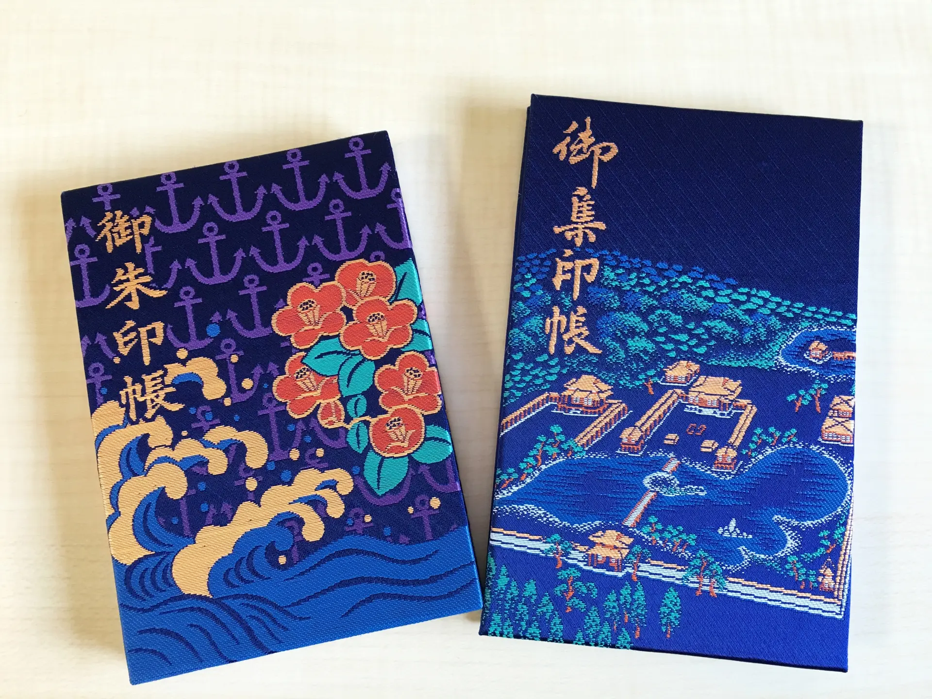 a couple of books sitting next to each other on a table .