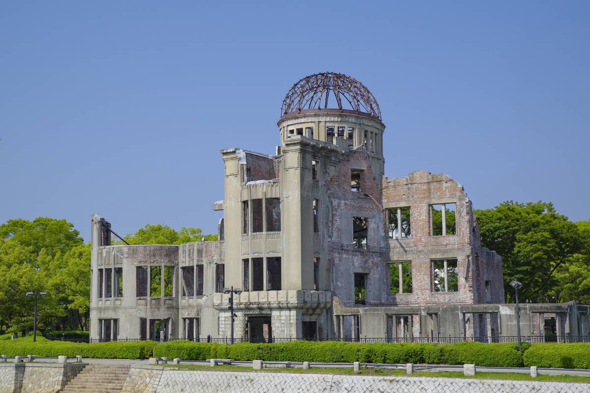 The Hiroshima A-Bomb Dome, a partially destroyed building with a skeletal dome
