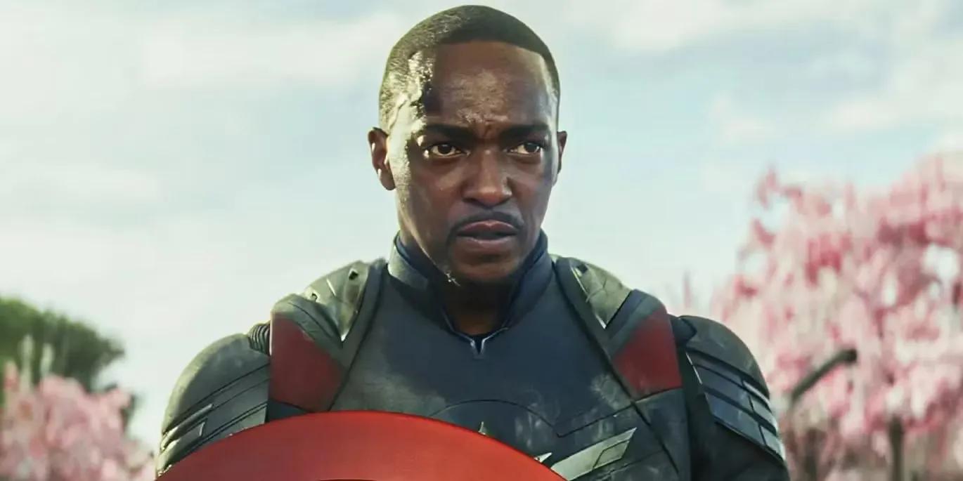 anthony mackie as captain america in brave new world with cherry blossoms in the background