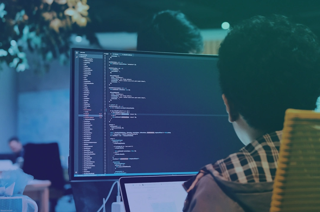 a close up of a software developer working on code