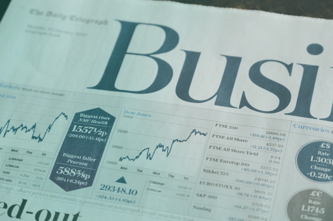 an image showing a close up of the financial section of a newspaper