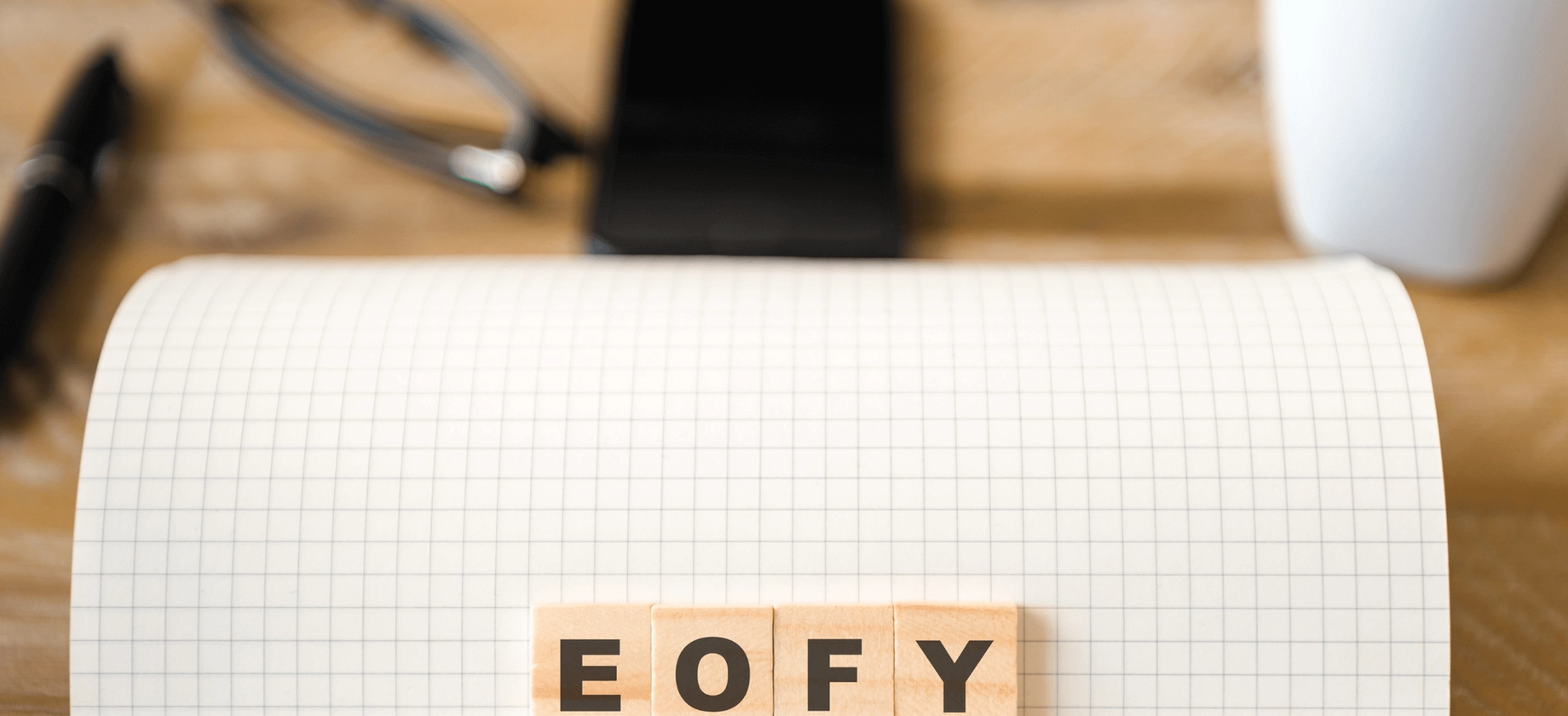 EOFY blocks on a piece of paper