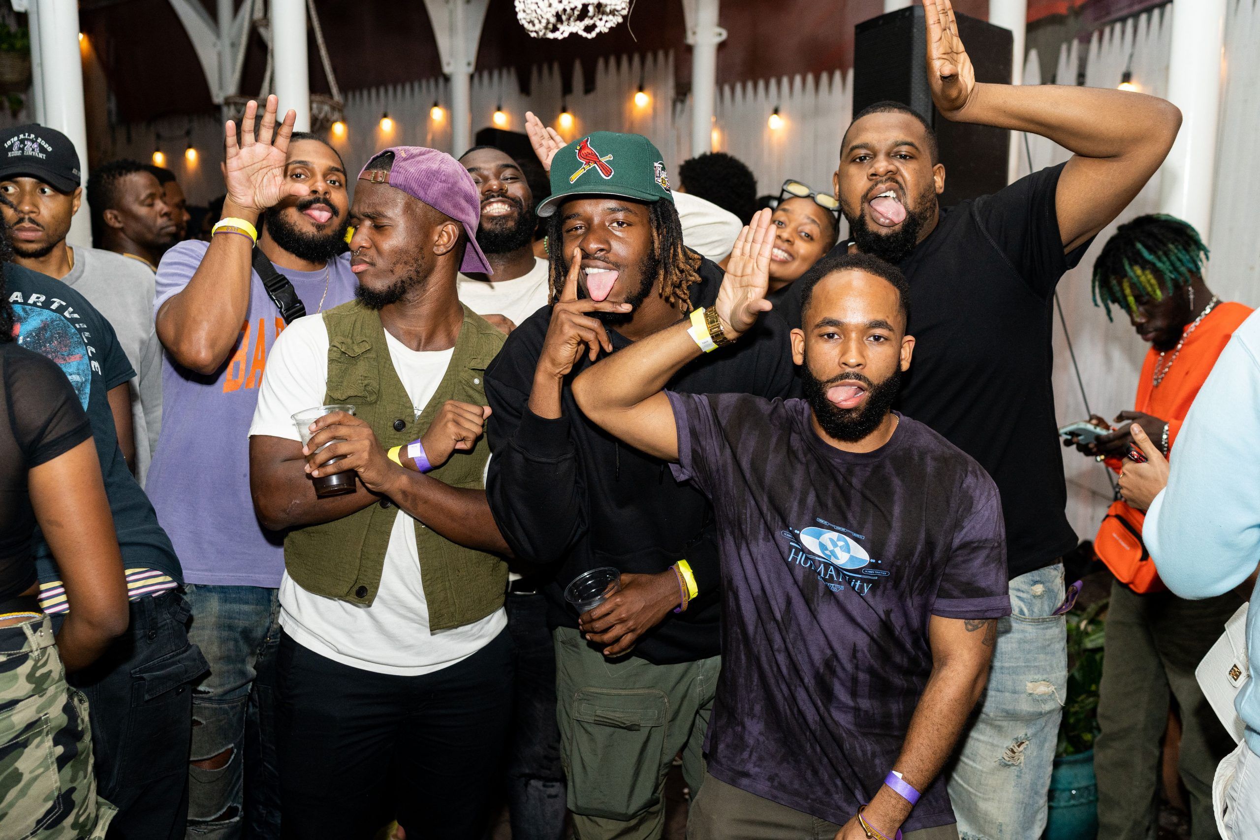 A group of friends posing on the dance floor