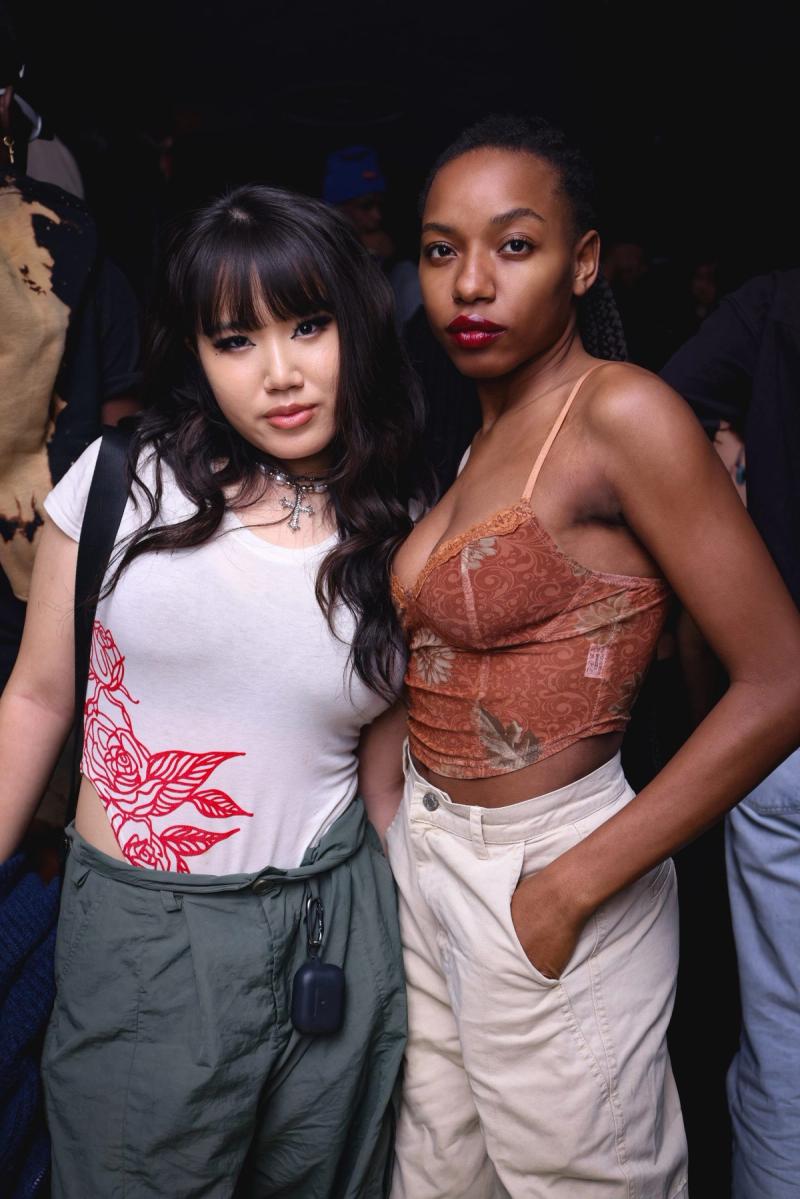 Two guests posing together