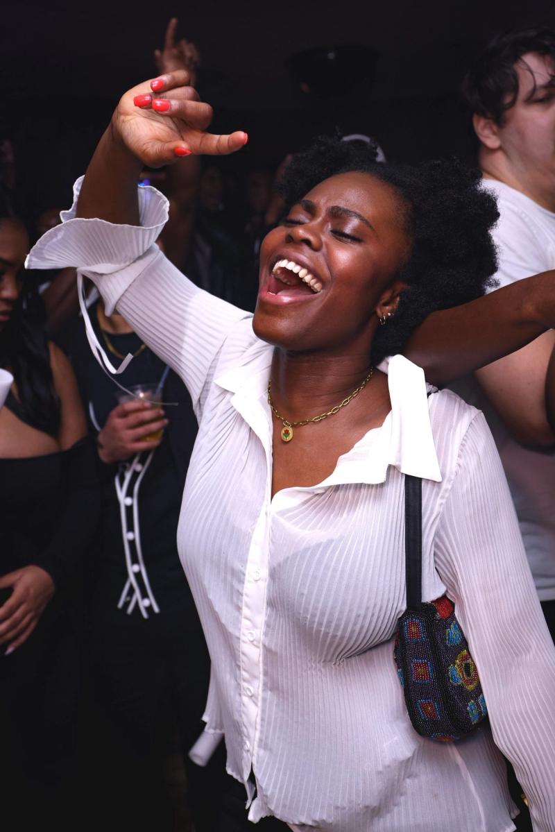 A guest dancing in the crowd