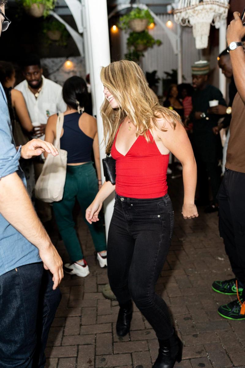A guest dancing in the middle of the floor