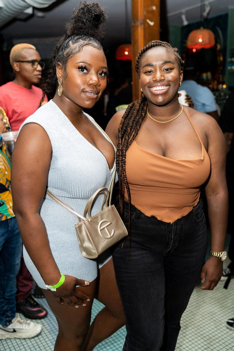 Two guests posing together