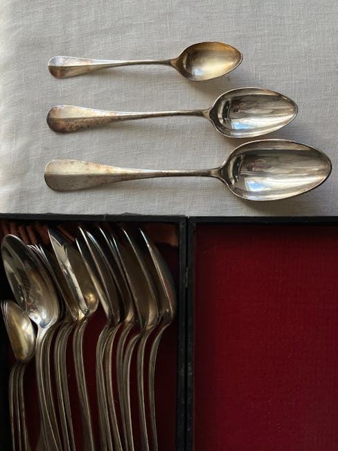 A collection of various spoons displayed neatly, highlighting the interest in spoon collecting.