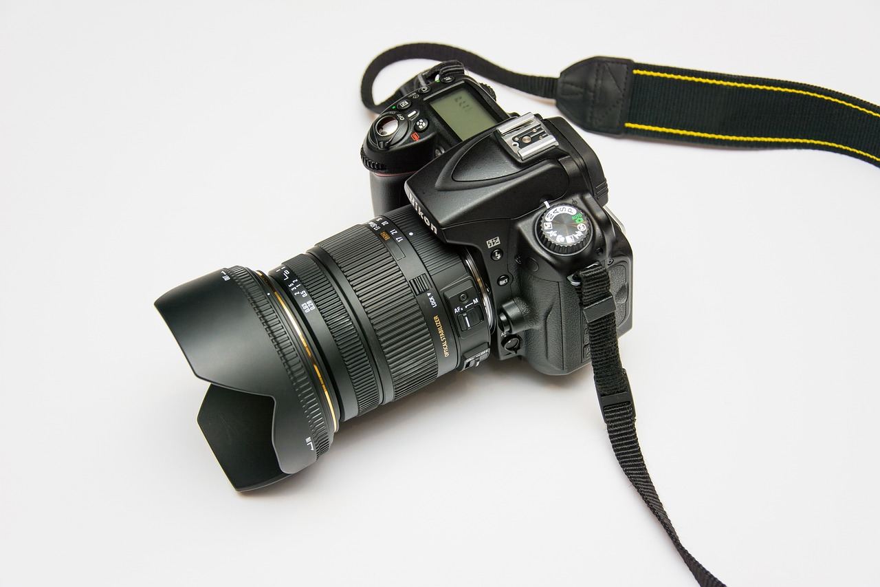 A professional camera sits on a tripod, ready to capture compelling stories through the lens of documentary filmmaking.