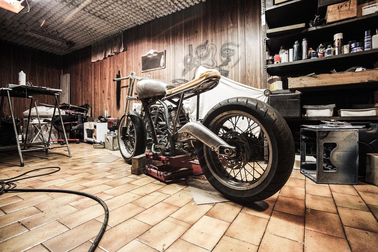 A motorcycle in a workshop, highlighting DIY mechanics for enthusiasts. Is DIY Mechanics for you? Let's find out!