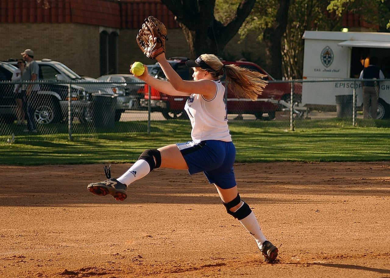 A fastpitch softball player in action, showcasing the excitement of the sport. Is Fastpitch Softball for you? Let's find