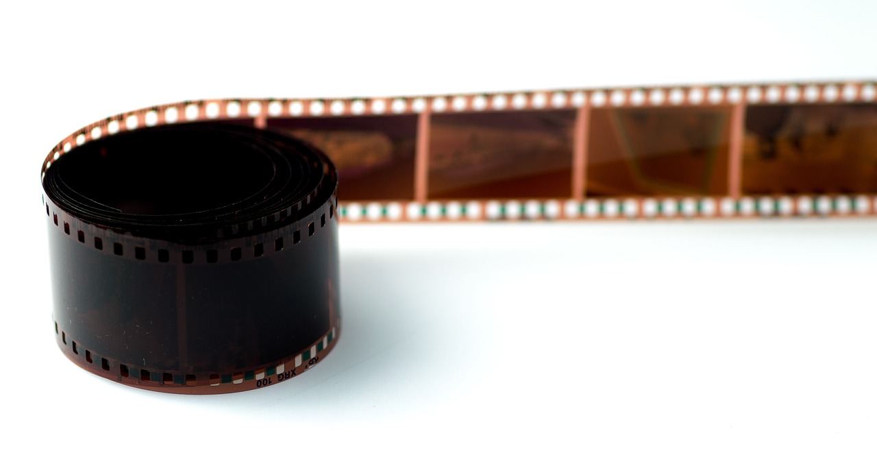 A close-up of a filmstrip, symbolizing the essence of film photography. Is Film Photography for you? Let's find out!