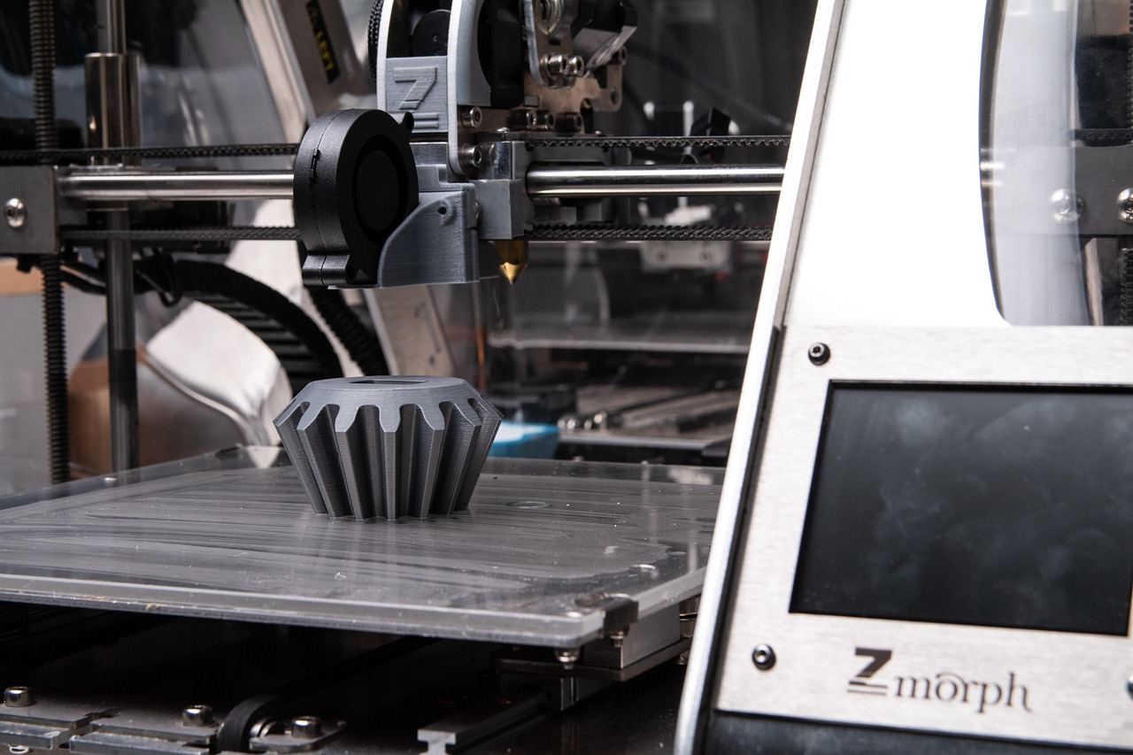 A sleek 3D printer with intricate components is set against a bright workspace, ready to create innovative designs.