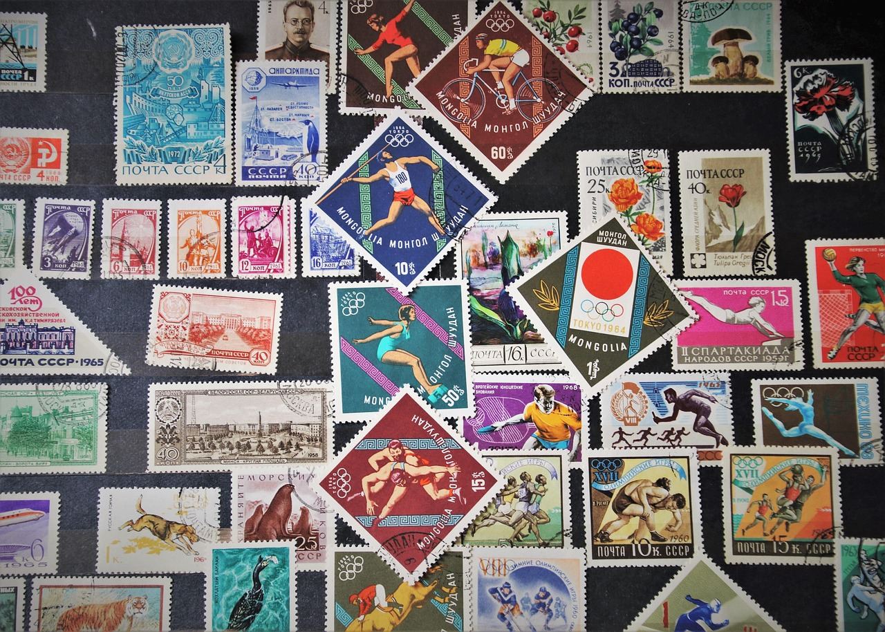 A vibrant collection of vintage postage stamps showcasing various designs, colors, and historical significance.
