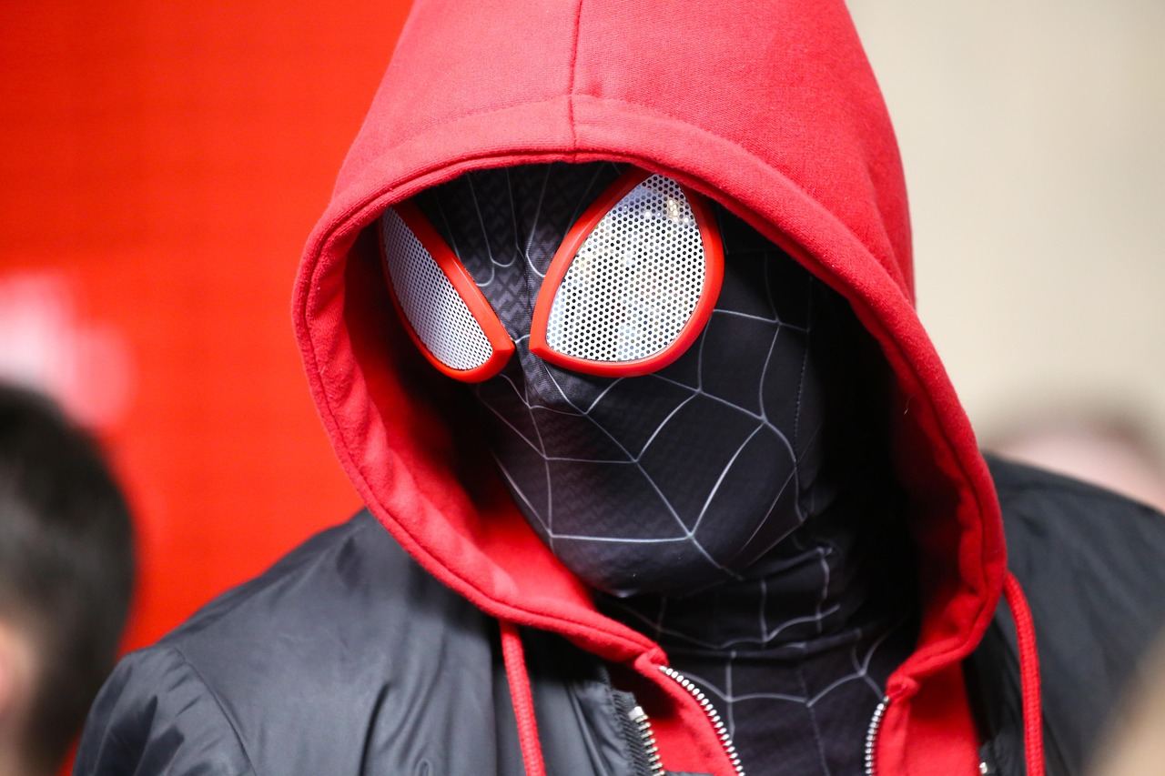 A cosplayer in a Spider-Man costume, embodying creativity in cosplay crafting. Is Cosplay Crafting for you? Let's find o
