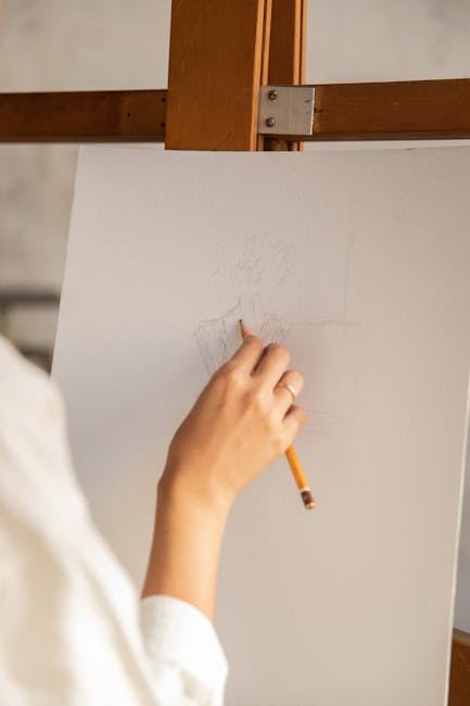 A hand sketching on a blank canvas, illustrating the process of gesture drawing for beginners.