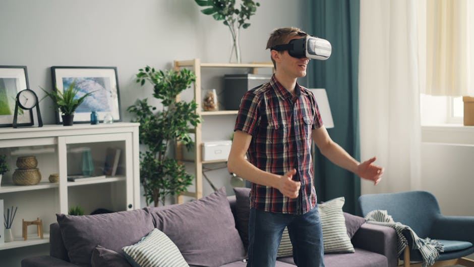 A young man wearing a VR headset, exploring virtual landscapes from the comfort of his living room.