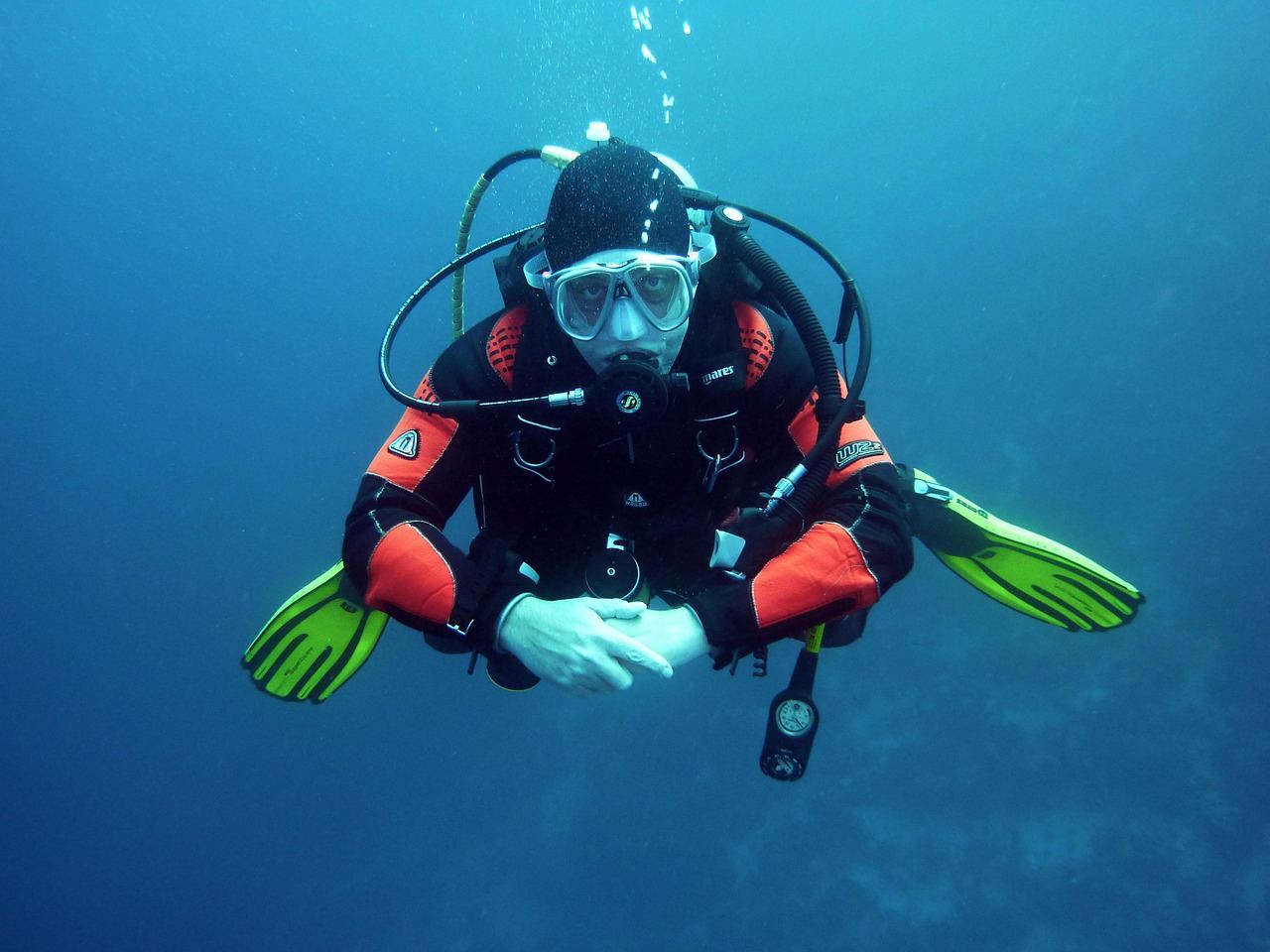 A technical diver in gear, exploring underwater depths. Is Technical Diving for you? Let's find out!
