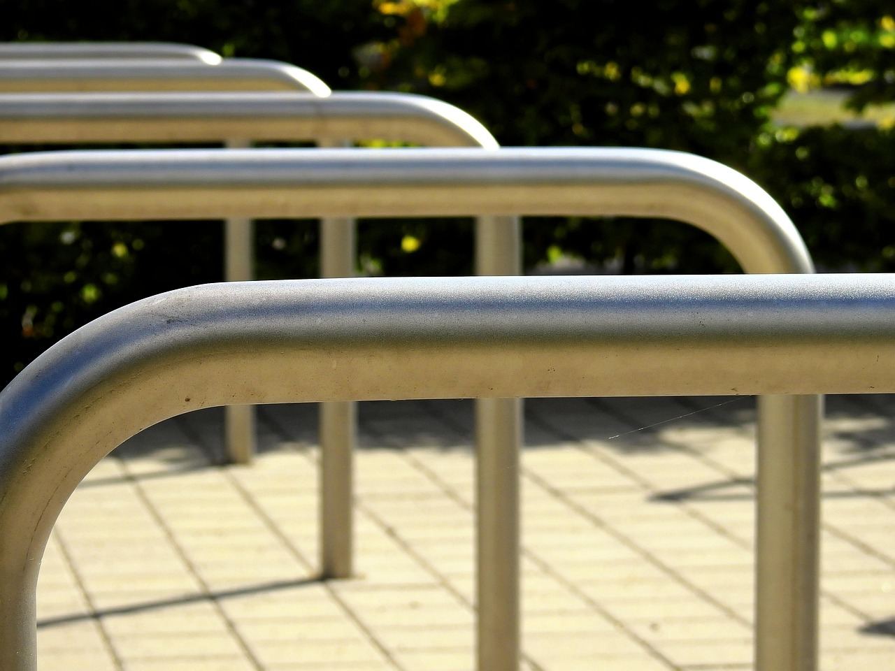 A spacious parking area surrounded by trees, perfect for visitors heading to the tubing spot.