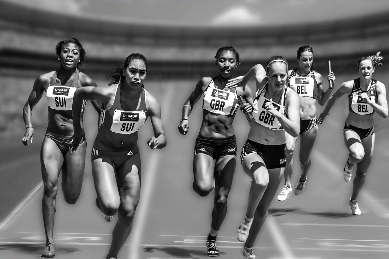 Women sprinting in a race, showcasing the spirit of endurance racing. Is Endurance Racing for you? Let's find out!