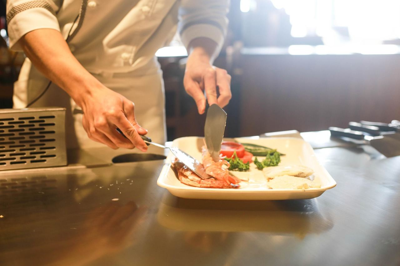 A chef preparing ingredients for sous vide cooking, exploring if it's right for you. Let's find out!