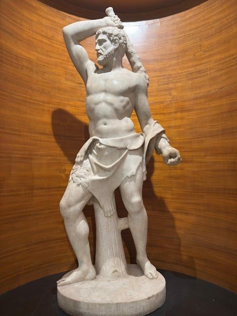 A muscular statue of a Greek warrior poised for combat, embodying the spirit of Unveiling Pankration.