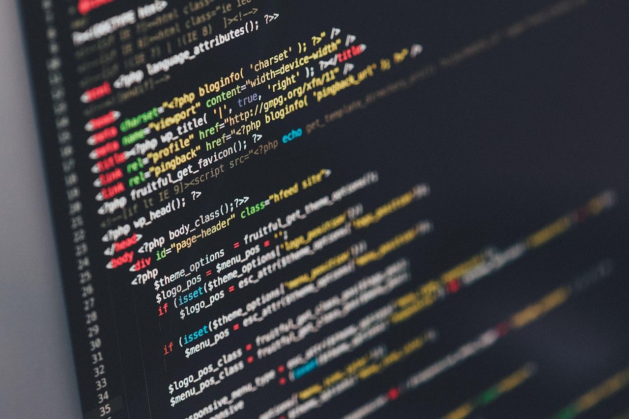Lines of colorful code on a computer screen, illustrating the intricacies of scripting and automation.