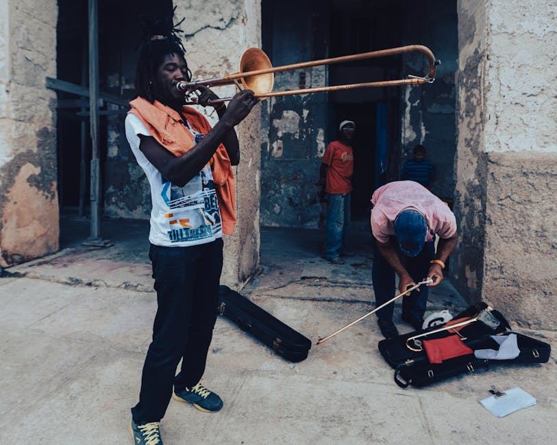 A musician playing the trombone outdoors, showcasing passion for music and the instrument.