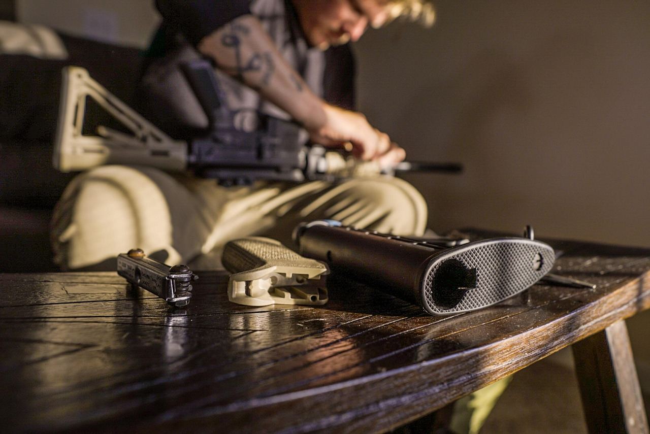 A gunsmith assembling a firearm on a workbench, exploring if gunsmithing is for you. Let's find out!